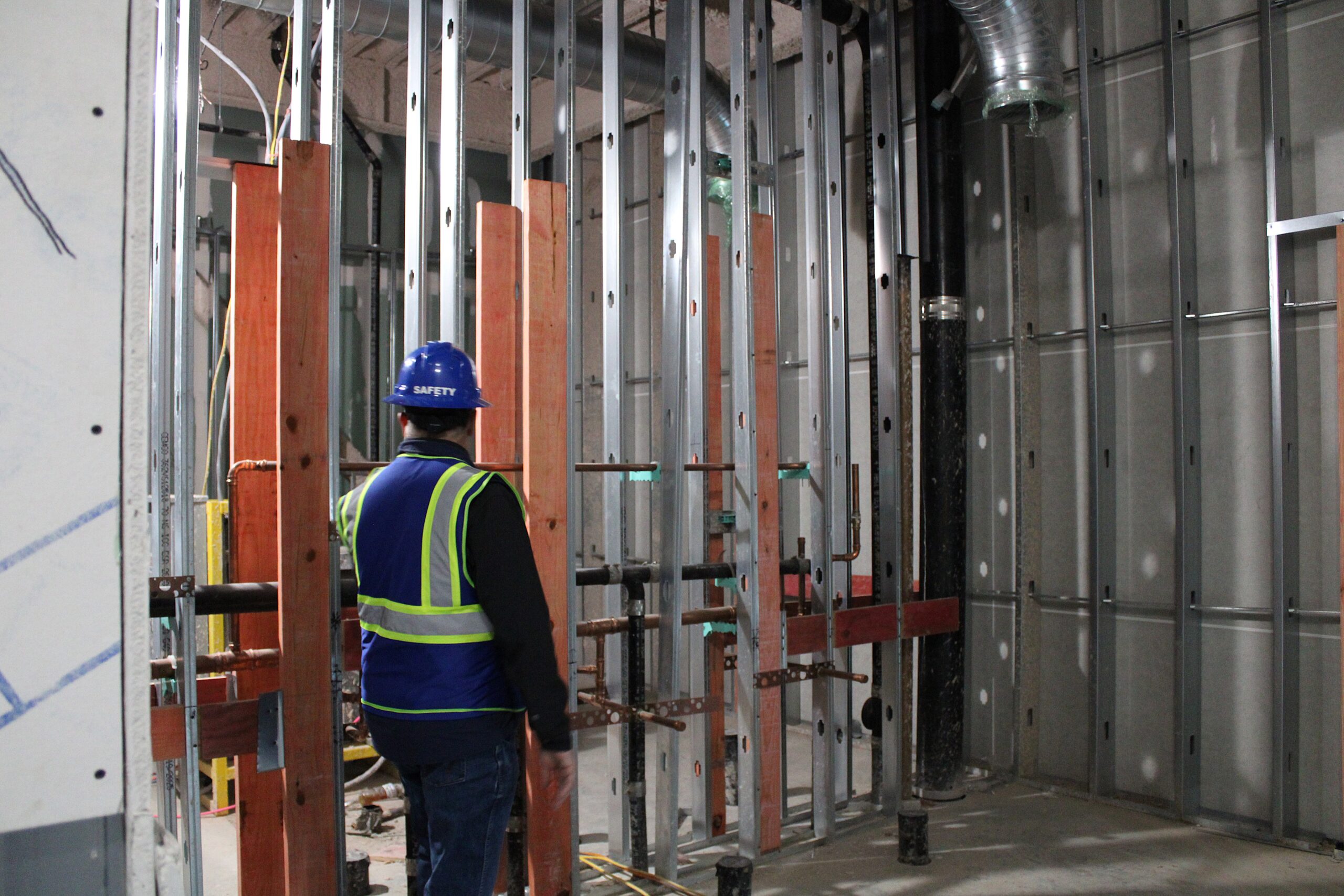 Adult,Entrepreneur,In,Formal,Wear,Standing,In,Conference,Room,And